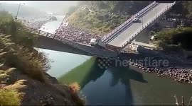 Miraculous escape after bridge collapses into two pieces