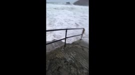 Storm Brian sends huge wave smashing into Cornwall