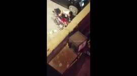 Children stealing petrol from motorbikes in Lahore