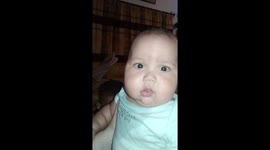 Baby spitting bubbles