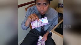 Magician performs awesome money tricks