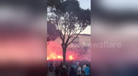 OM fans light up flares in front of Stade Velodrome in Marseille