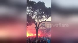 Newsflare Edit - OM fans light up flares in front of Stade Velodrome in Marseille