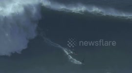 Surfers perform amazing 'double ride' in season's first major swell