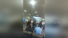Woman escorted by police after rant over choosing her seat
