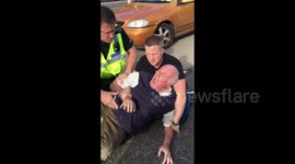 ORIGINAL: Cop wrestles road rage driver to ground after explosive rant