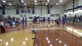 High-school volleyball player takes flight to make unbelievable save