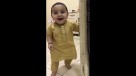 Cute baby trying to stand for the first time!