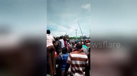 Protesters block street as Kenyans go to the polls