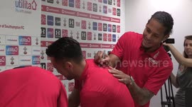 Van Dijk all smiles as he jokes around with fellow Saint Yoshida