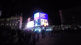 The Piccadilly Circus lights illuminated once more