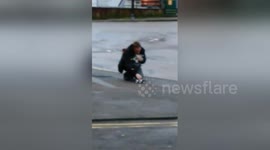 Seemingly inebriated man struggles to hold his beers