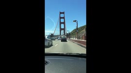 Driving through Golden Gate Bridge in San Francisco on a beautiful sunny day