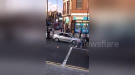 By-passers rush to pick alleged marijuana on high street