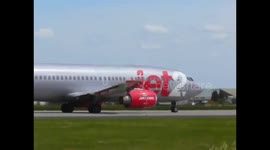 jet2 plane nearly clips runway with wing in windy takeoff