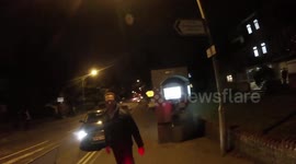 Cyclist confronts angry motorist driving on pavement