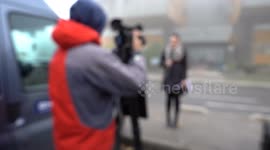 TV journalist reporting from the field