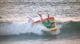 Ninja Turtle Surfs Giant Pizza Slice on Halloween