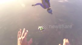 Skydiver in flying mid-air headbutt