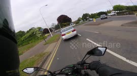 Idiot cutting me up on a roundabout. Motorbike vs car