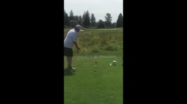 Golfer chunks his shot