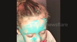 Toddler freaks out as she tries first face mask