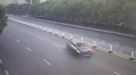 Wrong-way driver crashes into central reservation and flips