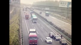 Motorists get out of cars after pileup but are mowed down by lorry