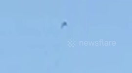 Newsflare Edit - Ship Shaped Obeject filmed floating above London
