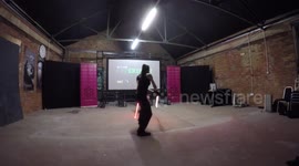 Esaam Rayn  teaching LED Saber Dueling at the Sci Fi London Experiment