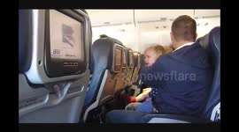 8 Hour Flight from Hell with Screaming Child