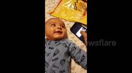 Moment baby hears own voice for first time