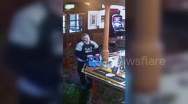Crook swipes poppy appeal collection tin and hides it down his PANTS