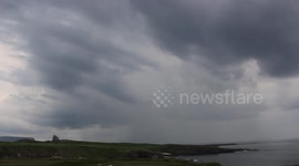 Thunderstorms passing with rumbles of thunder