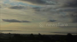 Stunning fog roll rolling over town