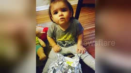 Cheeky baby steals cake