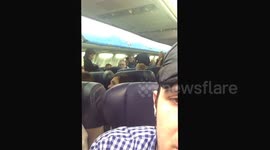 Lady dragged by cops off SW flight 245