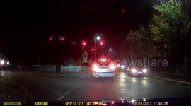 Car runs over motorbike and lifts car into the air in front of Police! - Dash Cam Footage