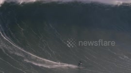 Moment British pro-surfer Andrew Cotton broke his back in horror wipeout