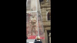 Remembrance statue, with automated poppies, displaying a humbling show.