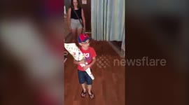 This is the emotional moment a nervous mom watches her autistic five-year-old meet his baby brother for the first time