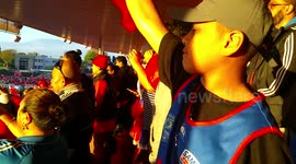 Young Sāmoan fan waves flag at 2017 Rugby League World Cup