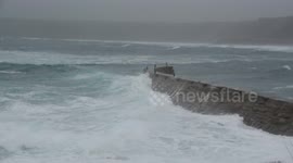 High winds and huge swell batter the Cornish coast