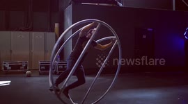 Acrobat spinning with a cool apparatus