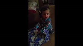 Child is so Excited to Unwrap Gift That she Forgets how to Speak