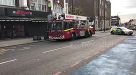 Firefighters respond to blaze above restaurant in south London