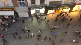 Rioters smash shop windows in Central Brussels