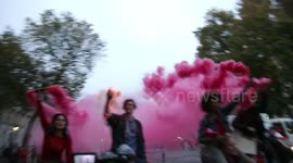 Free Education protesters outside Downing Street set of smoke grenades