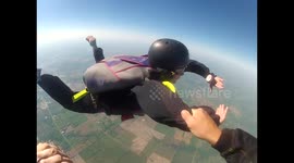 Skydiving student spins in the air like a top