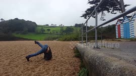 Father lands on his head after attempted backflip